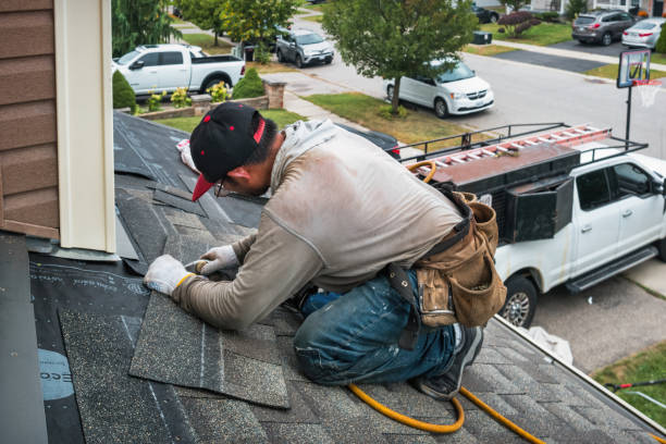 Professional Flat Roof Repair technician working in Bedias, TX